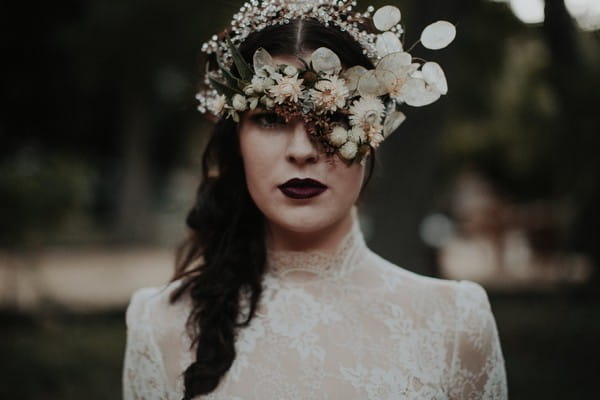 Bride with foliage mask over eyes