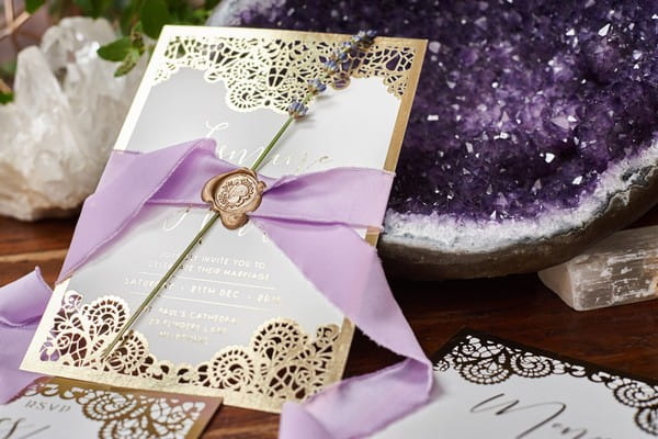 Wedding stationery with lavender and lilac ribbon