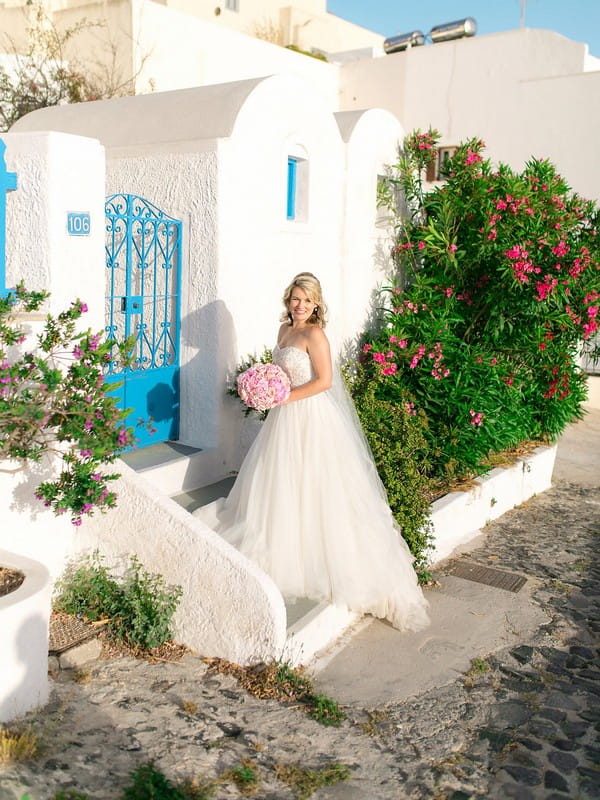 Bride outside house in Santorini