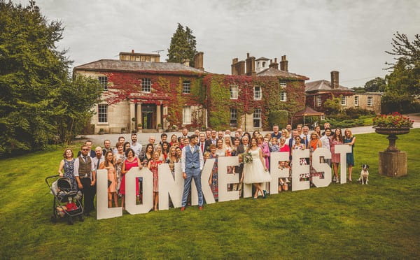 Wedding guests with Lonkerfest sign