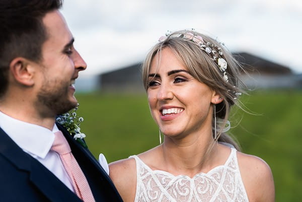 Bride and groom smiling