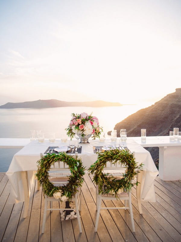 Small table for dinner after elopement in Santorini