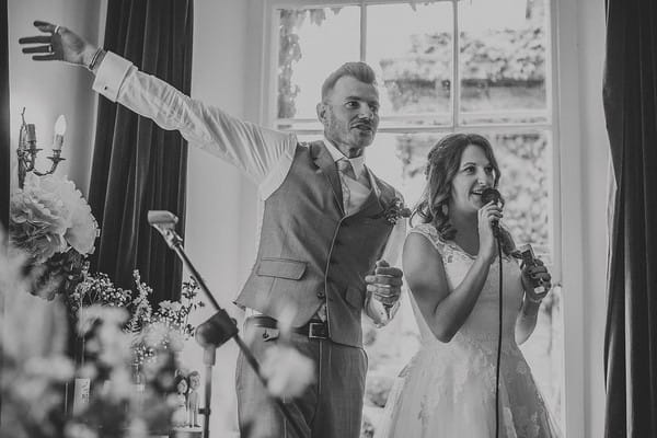 Bride and groom giving speech