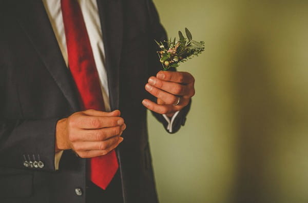 Man holding buttonhole