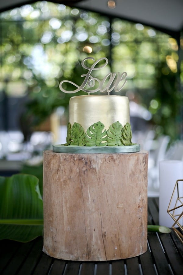 Metallic wedding cake with leaf design