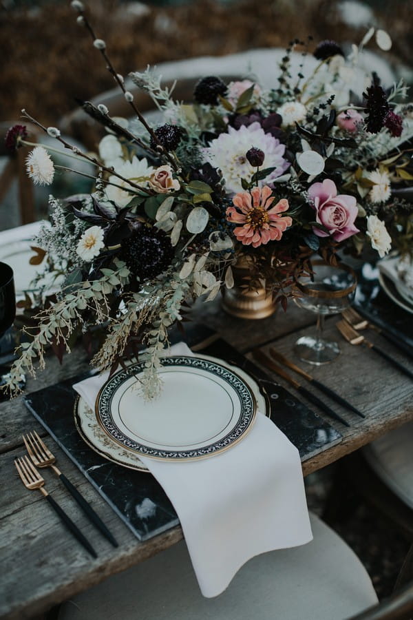 Moody autumn styled wedding place setting