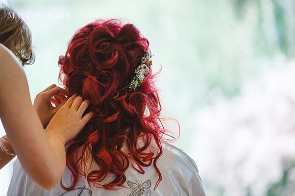 Hairdresser Adjusting Bride's Headpiece