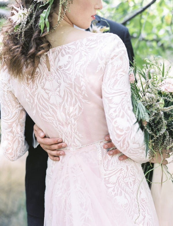 Detail on back of bride's lace wedding dress