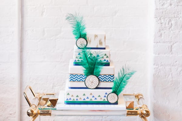 Wedding cake with geometric, green feather and dreamcatcher details