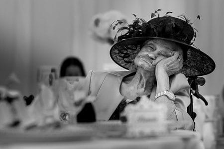 Elderly wedding guest asleep at table - Picture by Photography by Soven