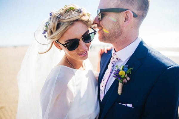 Bride and groom wearing sunglasses - Picture by Sally T Photography