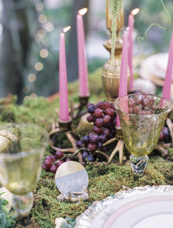 Candles and grapes on wedding table