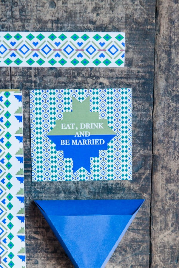 Blue and green geometric wedding stationery