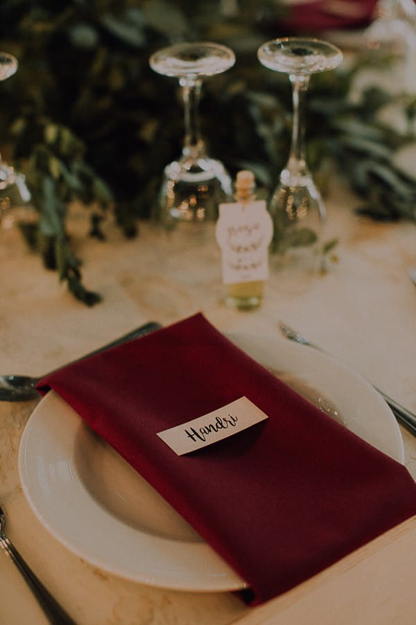 Red winter wedding place setting