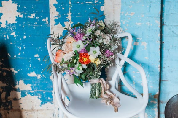 Wedding bouquet on white chair