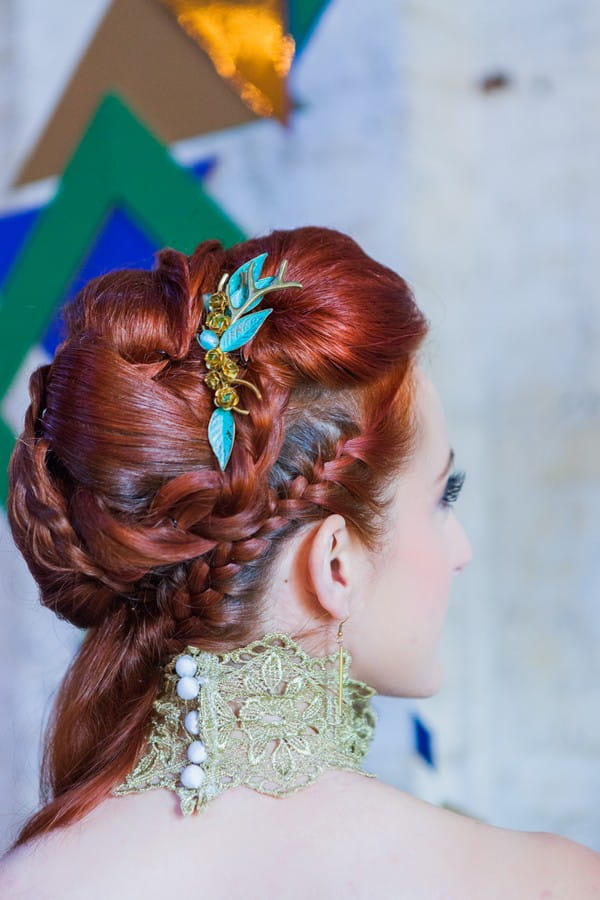 Braid detail and leaf accessory in bride's hair