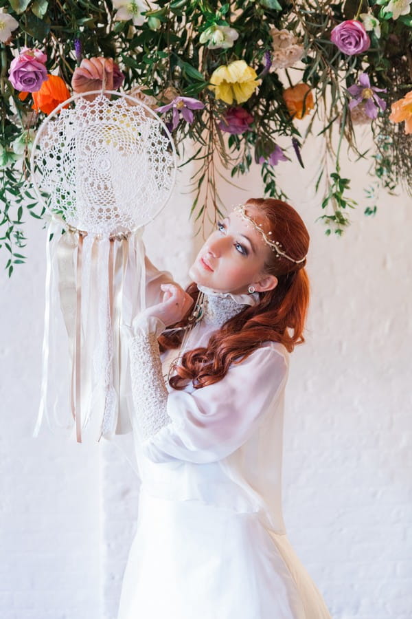 Bride hanging dreamcatcher