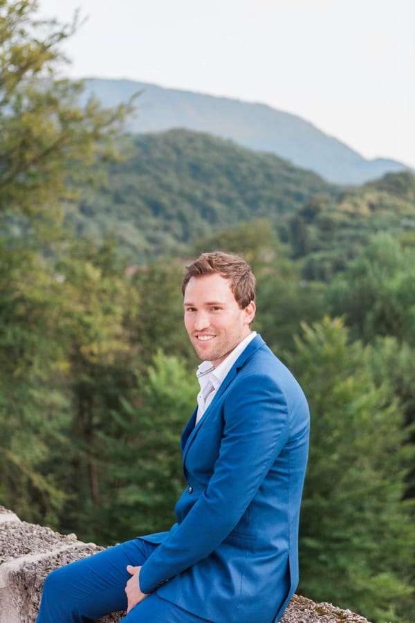 Groom wearing blue suit