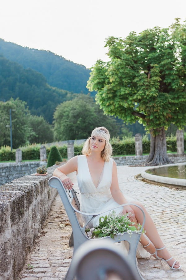 Bride sitting on bench