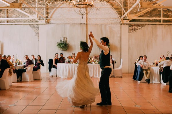 Bride twirling during first dance