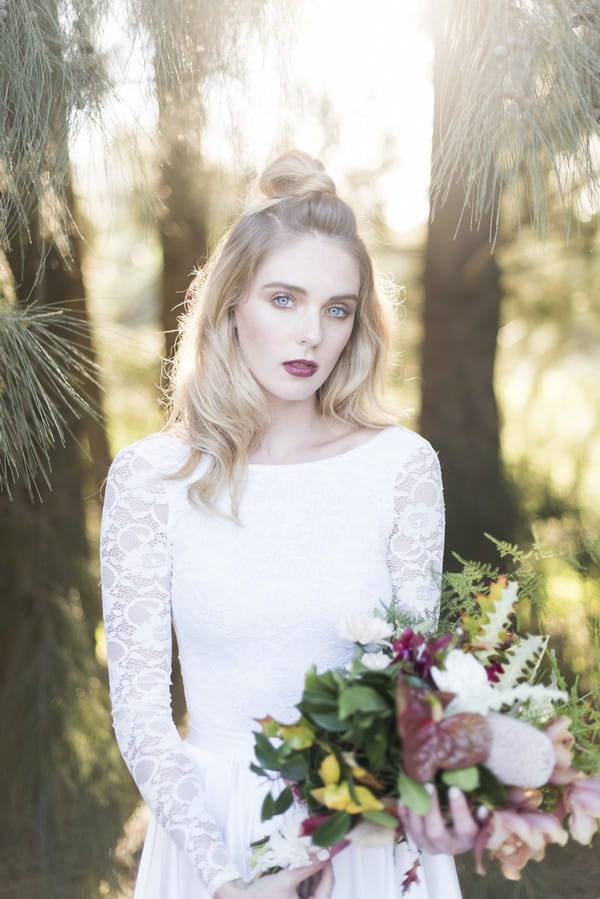 Bride with half up half down wedding hairstyle