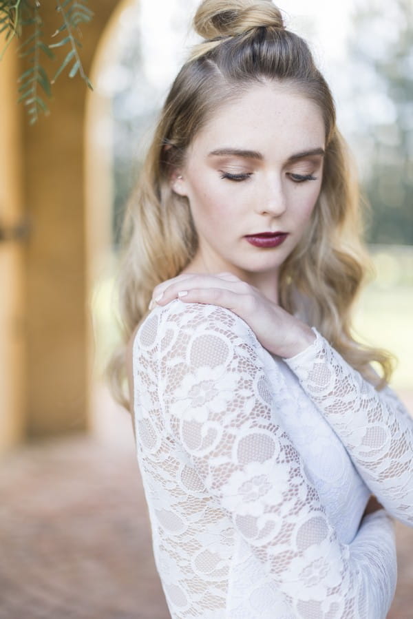 Detail on sleeve of bride's wedding dress