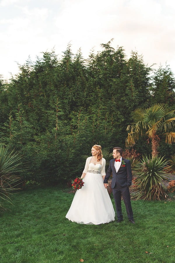 Bride and groom in grounds of The Watermill Hotel