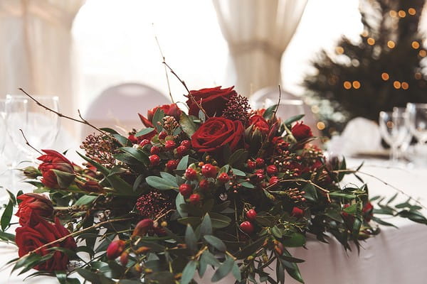 Red wedding top table flowers