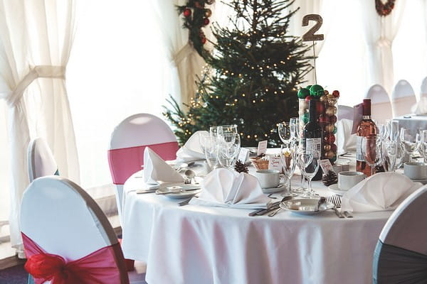 Christmas tree behind wedding top table