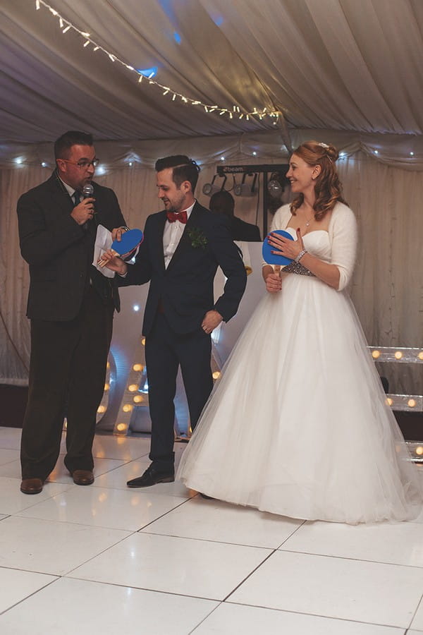 Bride and groom playing Mr and Mrs game