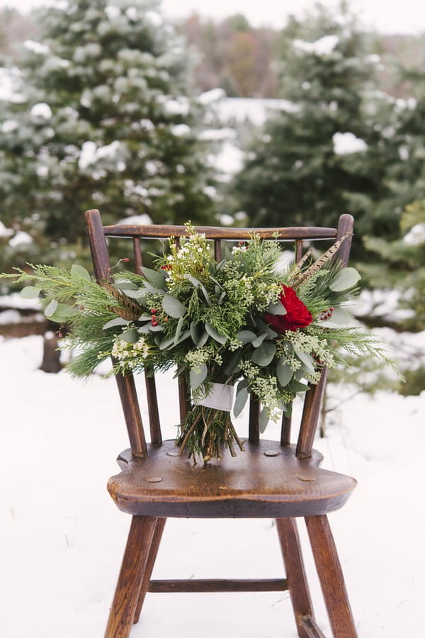 Winter bridal bouquet on chair