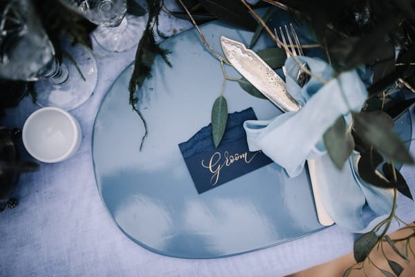 Blue styled groom wedding place setting