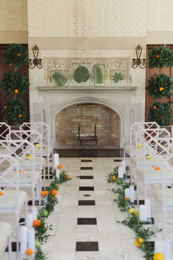 Wedding ceremony with citrus aisle styling