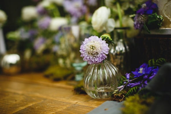 Small purple wedding table flowers