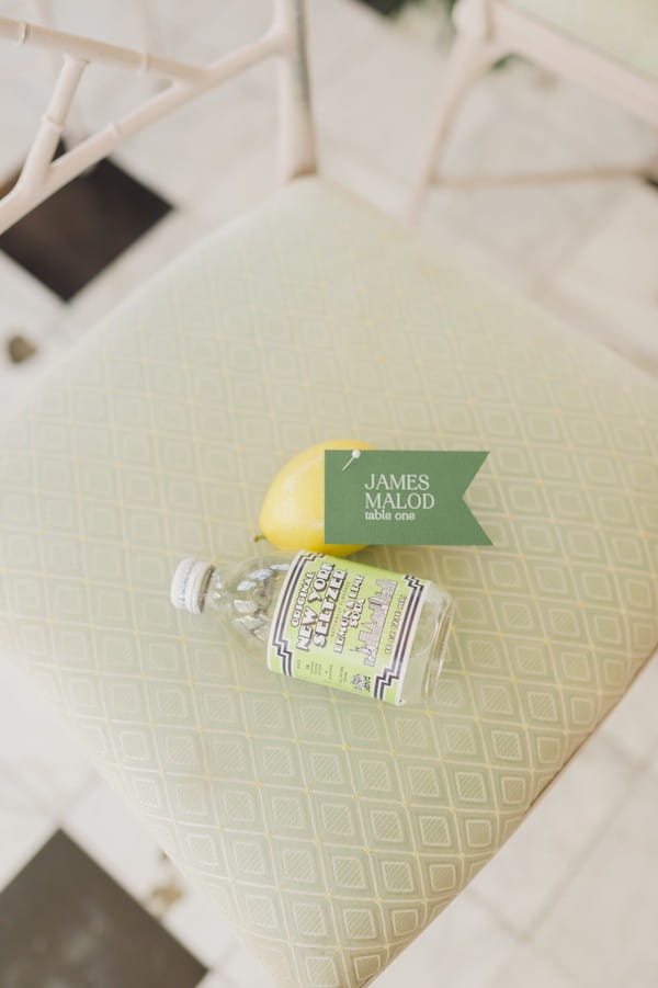 Lemon and bottle on wedding ceremony seat