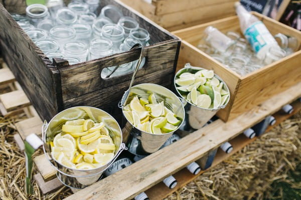 Buckets of slices lemons for wedding drinks