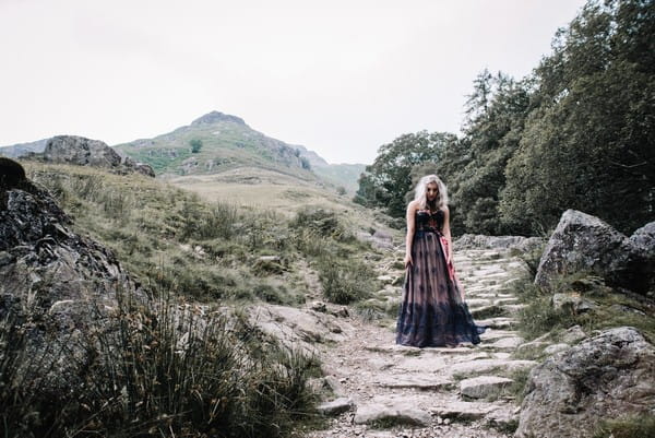 Bride walking in Lake District