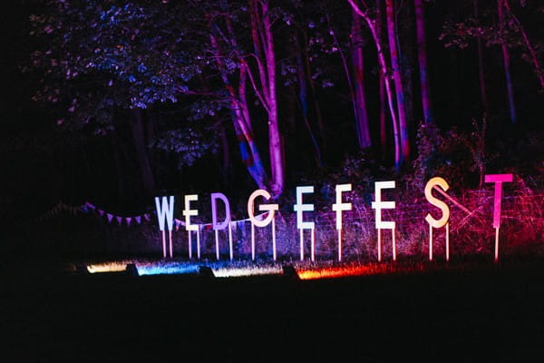 Wedgefest letters lit up at night