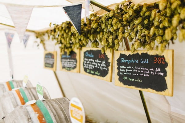 Ale signs in tent at wedding