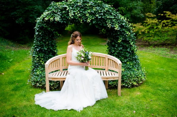 Bride sitting on bench