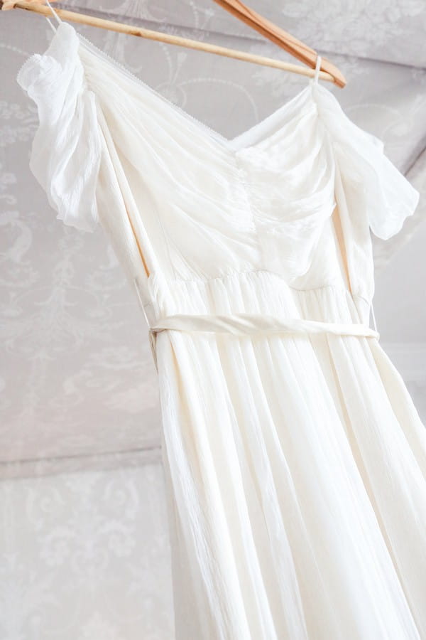 Wedding dress with draped detail