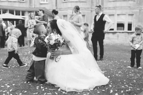 Bride kissing pageboy