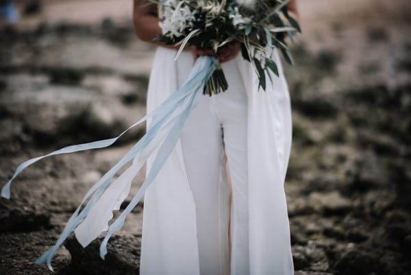 Blue ribbon on bridal bouquet