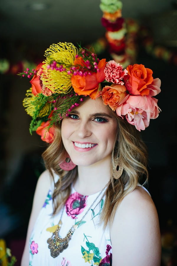 Woman wearing colourful floral crown