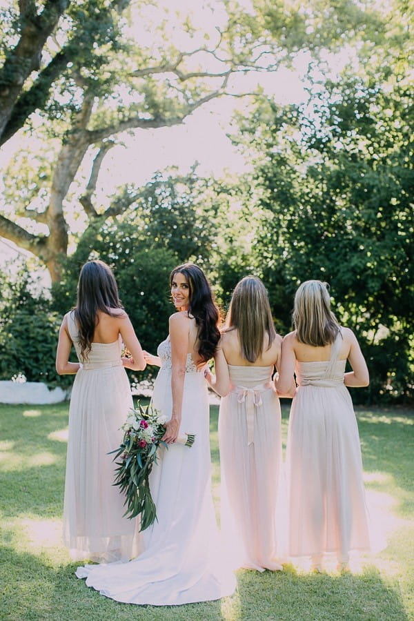 Back of bride and bridesmaids' dresses