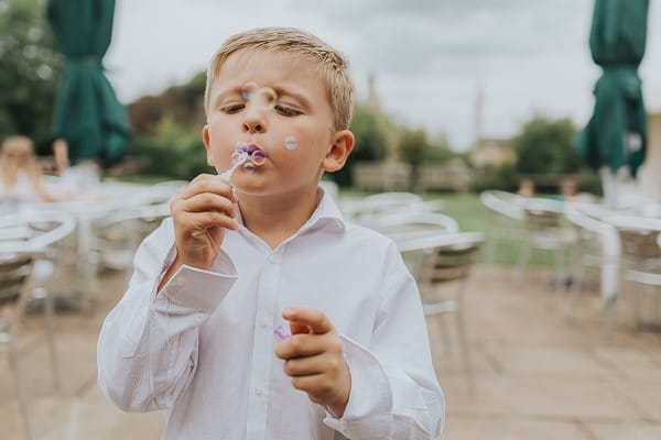 Child blowing bubbles