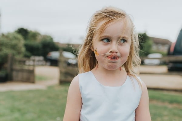 Child sticking tongue out