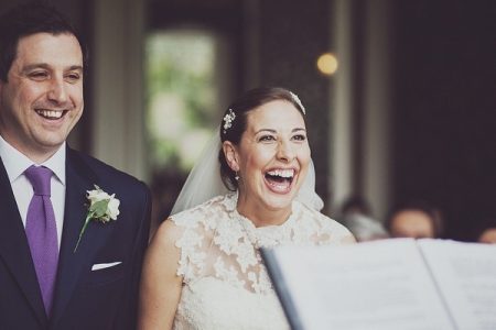 Bride and Groom Laughing During Civil Wedding Ceremony