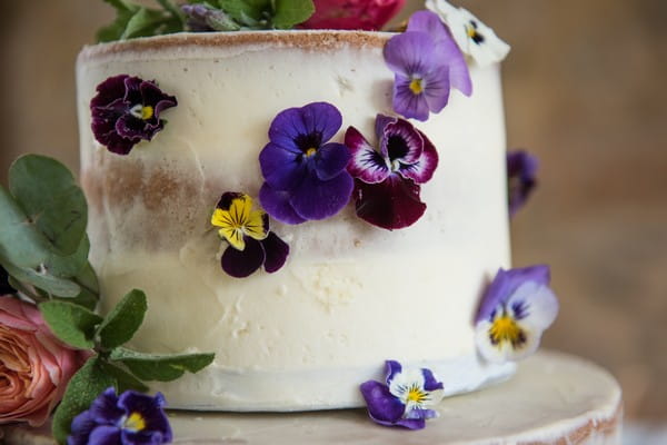 Edible flowers on wedding cake