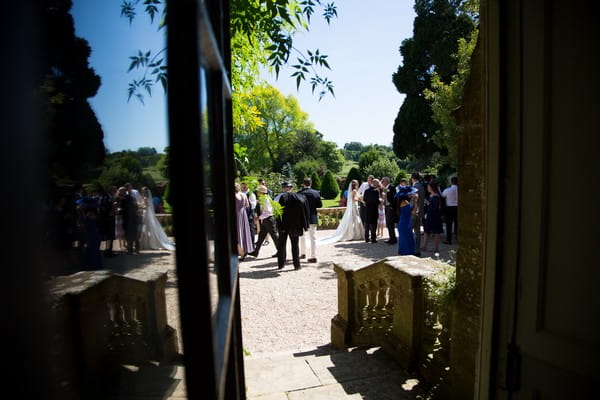 Wedding guests outside Brympton House